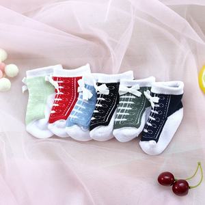 Calcetines cálidos y antideslizantes para bebés de 0 a 12 meses, cinturón para zapatillas, vestido de algodón con patrón de logotipo para niños y niñas, verano e invierno - Product Image 2