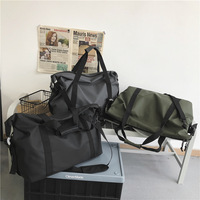 Sac de voyage extensible grande capacité en nylon imperméable avec poignée souple pour les voyages en plein air