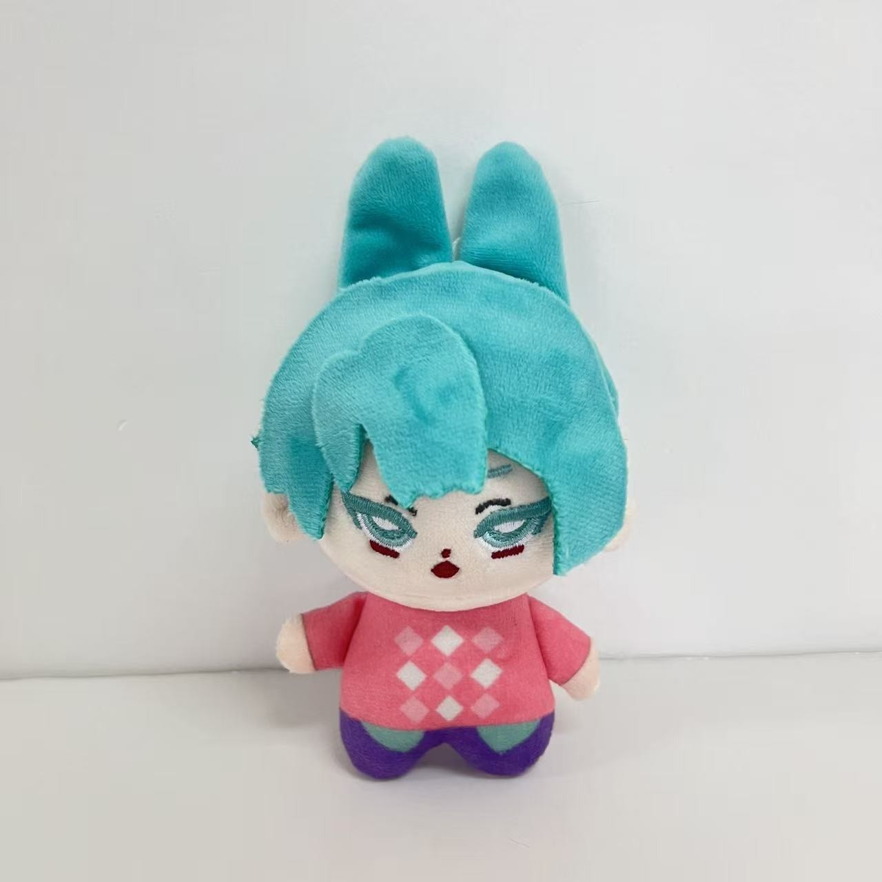 Green hair and purple clothes