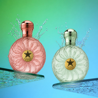 Flacon de parfum vide élégant, rond et texturé, 30ml, 50ml, 100ml, avec couvercle doré artistique et irrégulier personnalisé pour fabricant de parfums