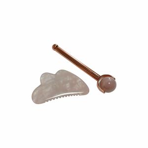 Rouleau de massage en quartz rose et planche de gua sha pour le visage et le corps - Product Image 4