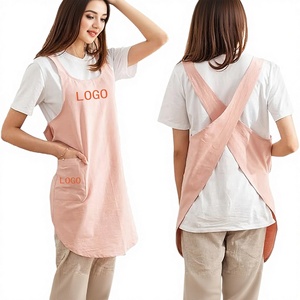 Delantal de algodón con tirantes cruzados al por mayor, con logo personalizado, para mujer, floristería, cafetería, repostería, cocina, ropa de trabajo OEM - Product Image 2