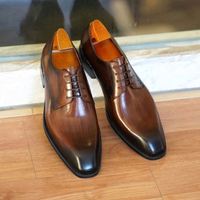 Chaussures en cuir populaires Yi Nuo 2026 pour hommes d'âge moyen en cuir véritable, tenue de ville