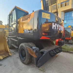 Excavatrice sur pneus Hyundai 210W-7/210W-9 d'occasion, moteur d'origine coréen, moteur à engrenages, 21 tonnes, bon état, en stock - Product Image 1