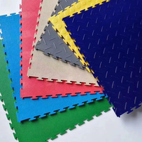 Gummi-PVC-Bodenbelag Ineinandergreifende Fliesen für Garagenboden Matten für Schwerlast-Lager Werkstatt Hersteller aus China
