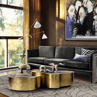 Table basse de luxe en acier inoxydable martelé à la main avec plateau miroir noir, design courbe pour intérieurs modernes