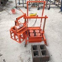 Machine automatique pour la fabrication de briques, plastique et béton