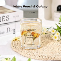 Bougie pilier parfumée boisée en cire transparente avec fleurs séchées naturelles Winby A03T 2026 – Vente directe usine, faible MOQ, idéale pour les cadeaux