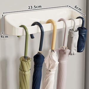Support mural moderne en plastique pour 4 parapluies, organisateur de rangement pour parapluies - Product Image 2