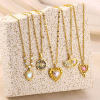 Collier pendentif en forme de coeur en acier inoxydable PVD or 18 carats imperméable et non terni avec breloque d'amour en trois dimensions