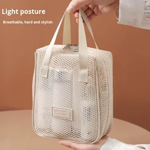 Sac de voyage multifonctionnel haut de gamme <span class=keywords><strong>en</strong></span> nylon respirant avec fermeture éclair, compartiments multiples et grande capacité, idéal pour les cosmétiques et le transport à la main. - Product Image 3