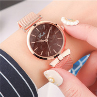 Montre à quartz pour femme avec nœud papillon, bracelet en acrylique, écologique, tendance, best-seller du commerce extérieur, vente en gros d'usine