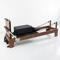Reformer Pilates en chêne, machine de Pilates pliable pour yoga et Pilates, fabricant d'usine