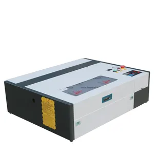 Pabrik Outlet Desktop 4060 CO2 Laser ukiran mesin pemotong kayu batu karet kertas kristal MDF penggunaan Rumah mendukung Format DXF