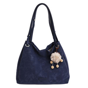 Brownish-<b>yellow</b> suede shoulder <b>bag</b> with a sweet, plush charm; women's handbag. - Product Image 2