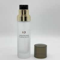 Offre spéciale couvercle en croix dorée couvercle semi-transparent noir bouteille en verre dépoli pompe à lotion