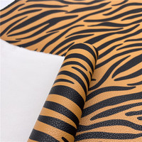 Tissu PU en cuir synthétique à motif zèbre pour la décoration de sacs et de meubles