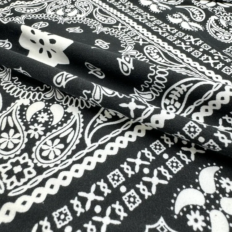 Custom 170gsm Soft White Printed Polyester Spandex Fabric On Black Background For Dress
