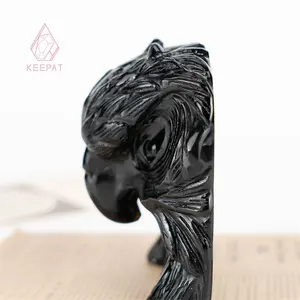 Ingrosso nuovo design di intaglio di pietra nera di ossidiana testa di astore animale intaglio per la decorazione