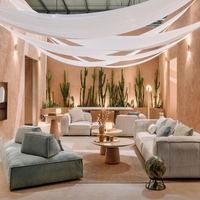 Canapé modulaire en tissu bouclé garni d'éponge compressée, durable et peu encombrant, pour la décoration d'appartements modernes