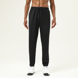 Venta al por mayor logotipo personalizado hombres pantalones gimnasio Fitness pantalones con cremallera bolsillo moda Joggers para hombres - Product Image 1