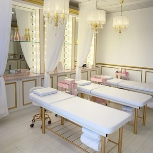 <span class=keywords><strong>Table</strong></span> <span class=keywords><strong>de</strong></span> <span class=keywords><strong>massage</strong></span> et <span class=keywords><strong>de</strong></span> soin du visage pliable pour salon <span class=keywords><strong>de</strong></span> beauté, avec cadre en bois et métal, réglable en hauteur, moderne, vente en gros - Product Image 1