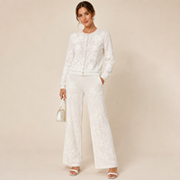 Ensemble deux pièces de luxe pour femme, personnalisé ODM, respirant, décontracté, entièrement blanc, en maille florale, avec strass assortis, ouvert sur le devant, avec ceinture et fermeture éclair
