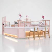 Kiosque de Bijouterie Personnalisé en Or Rose avec Comptoir d'Exposition en Verre et Zone d'Expérience pour Centre Commercial de Vente au Détail