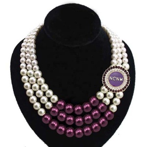 Collana di perle rotonde viola a tre fili con ciondolo del Consiglio Nazionale delle Donne Afroamericane Topvesko - Product Image 1
