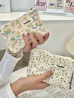 Petite trousse de toilette portable en polyester tendance de rue avec fermeture éclair pour le maquillage et le rangement du rouge à lèvres