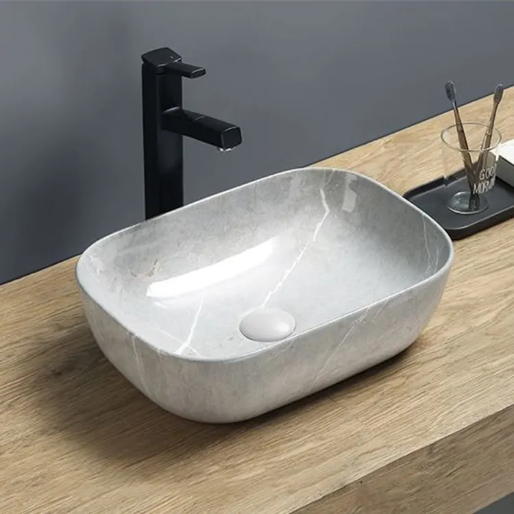 Lavabo de cerámica para baño, encimera de diseño de mármol brillante, barato, de estilo europeo