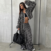 Ensemble de survêtement décontracté deux pièces pour femme, comprenant un sweat à capuche court et un pantalon large à imprimé floral en dentelle