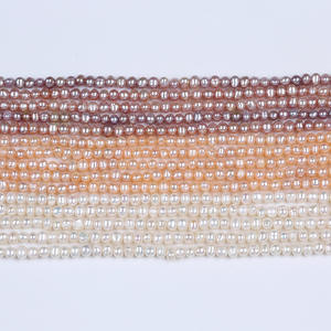 Vente en gros de matériaux et accessoires de bijouterie DIY de Zhuji, perles d'eau douce naturelles blanches et violettes de 4 à 5 mm, en vrac, pour la création de bijoux - Product Image 1