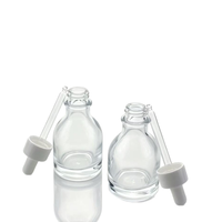 Vente en gros de flacons compte-gouttes transparents en verre épais de 50 ml en stock, emballage cosmétique en verre.