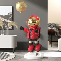 Statues de bureau en résine de plateau de combinaison spatiale d'astronaute
