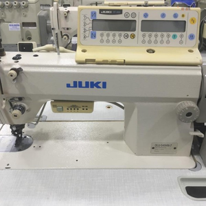 <span class=keywords><strong>Machine</strong></span> <span class=keywords><strong>à</strong></span> <span class=keywords><strong>coudre</strong></span> industrielle JUKI DLU-5494N-7 d'occasion en excellent état, point noué simple, avec coupe-<span class=keywords><strong>fil</strong></span> <span class=keywords><strong>automatique</strong></span> et programme de recul de point. - Product Image 2