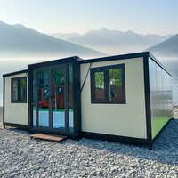 Maison conteneur modulaire extensible de luxe en acier à toit plat, avec chambre et cuisine, installation rapide, pod de vie portable pour le camping en extérieur