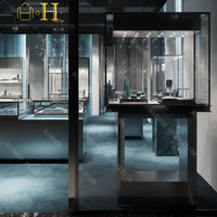 Vitrine de présentation de bijoux murale à texture verticale, comptoir de présentation de bijoux en verre