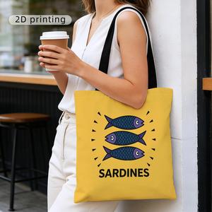Sac à main à motifs avec une grande capacité. Il présente un motif de poisson sur un fond orange avec du texte sur les sardines et des écailles bleues - Product Image 5