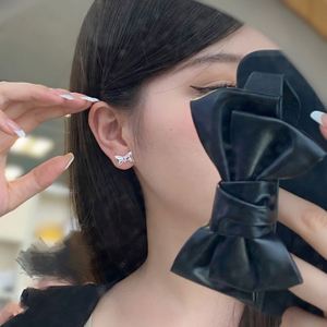 Dylam 925 Sterling Silver Rhodium Plated Women Fine Jewelry Bow Tie 5A CZ Cubic Zirconia Tiny Cute Stud <b>Earrings</b> - Product Image 3