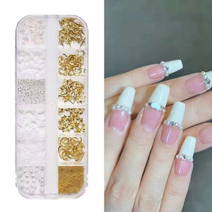 Boîte de 12 compartiments pour décorations d'ongles : Perles, rivets métalliques, breloques en forme de pétales, accessoires de manucure variés - Product Image 1