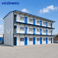 VICDOWEX Maison préfabriquée contemporaine de type K à trois étages pour dortoirs et bureaux de travailleurs de chantier