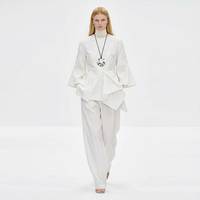 Chemisier ample en tissu tissé blanc vintage élégant avec broderie et ourlet festonné, manches larges, style cape poncho pour femme, vente en gros personnalisée