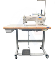Machine à coudre industrielle à point noué à grande vitesse avec table et servomoteur JUKI DLN-9010A-SH
