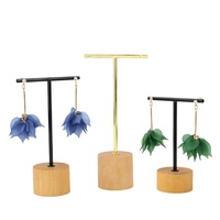 Présentoir à bijoux en bois massif noir et laiton, avec supports en métal doré en forme de T pour boucles d'oreilles