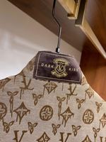 Luxuriöse Alltags-Oberbekleidung Ikonischer Beschichteter Canvas-Mantel mit Lederbesatz Zeitlose Bedruckte Monogramm-Jacke für Herren