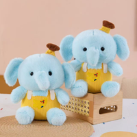 Jouet en peluche éléphant mignon en forme de banane. Poupée éléphant bleue parfumée comme compagnon de table. Poupée cadeau d'anniversaire pour filles.