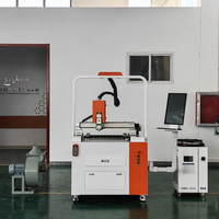 Découpeuse laser à fibre CNC industrielle 1,5 kW 3 kW avec système de refroidissement par eau OEM et ODM pour tôles en acier inoxydable et acier au carbone