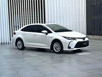 Toyota Corolla d'occasion 2022 - Économie d'énergie, caméra panoramique 360°, conduite à gauche, transmission manuelle, moteur turbo, intérieur cuir foncé