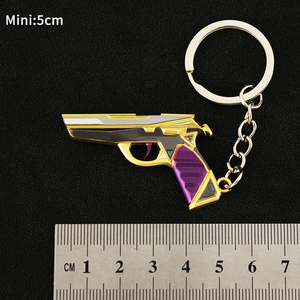 Llavero Clásico Prime de Valorant, Diseño Dorado y Morado con Grabado en Relieve, para Colección de Gamers y Pequeño Regalo Navideño - Product Image 3